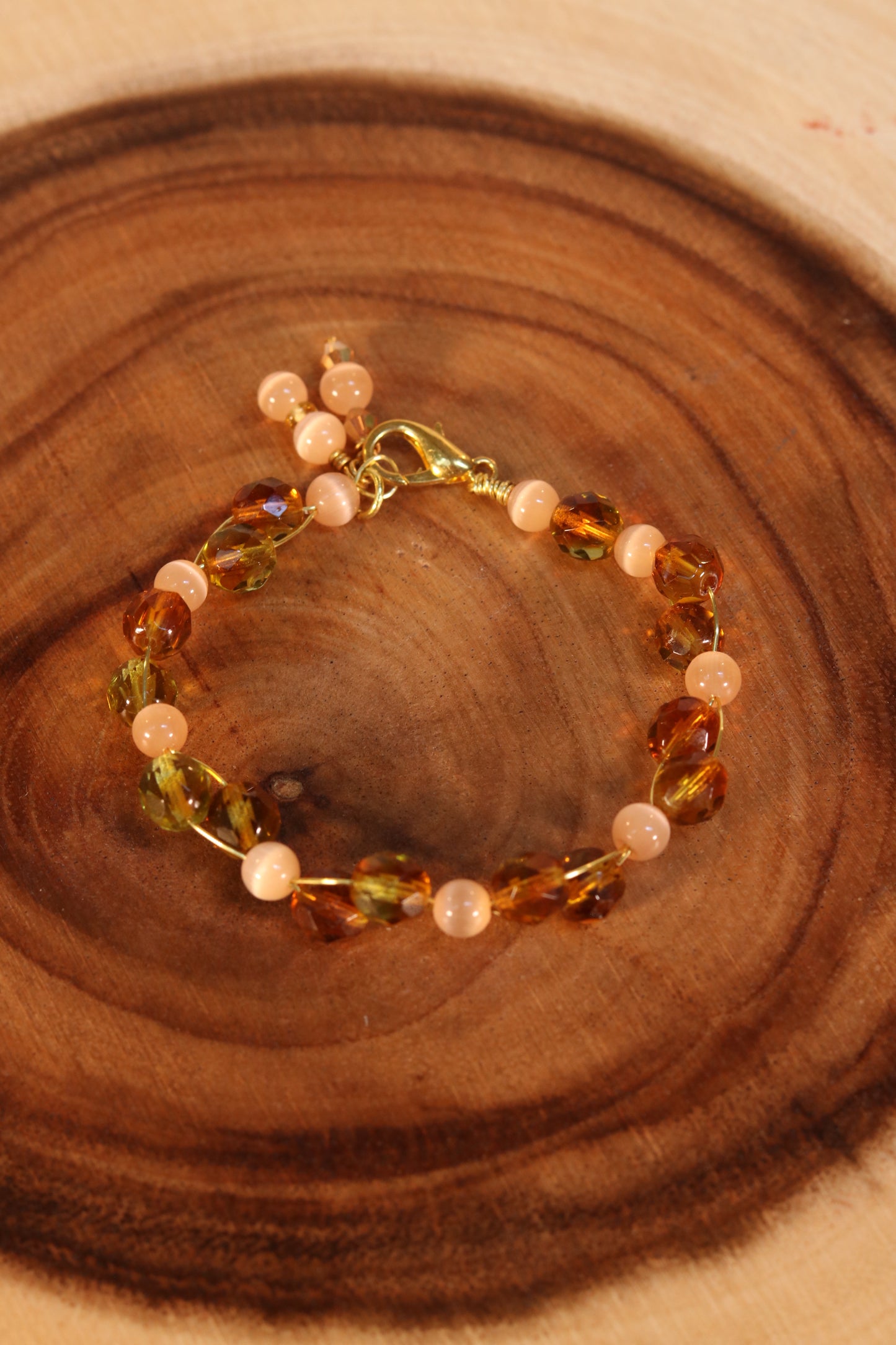 Gold Wire Bracelet with Brown and Pink Beads