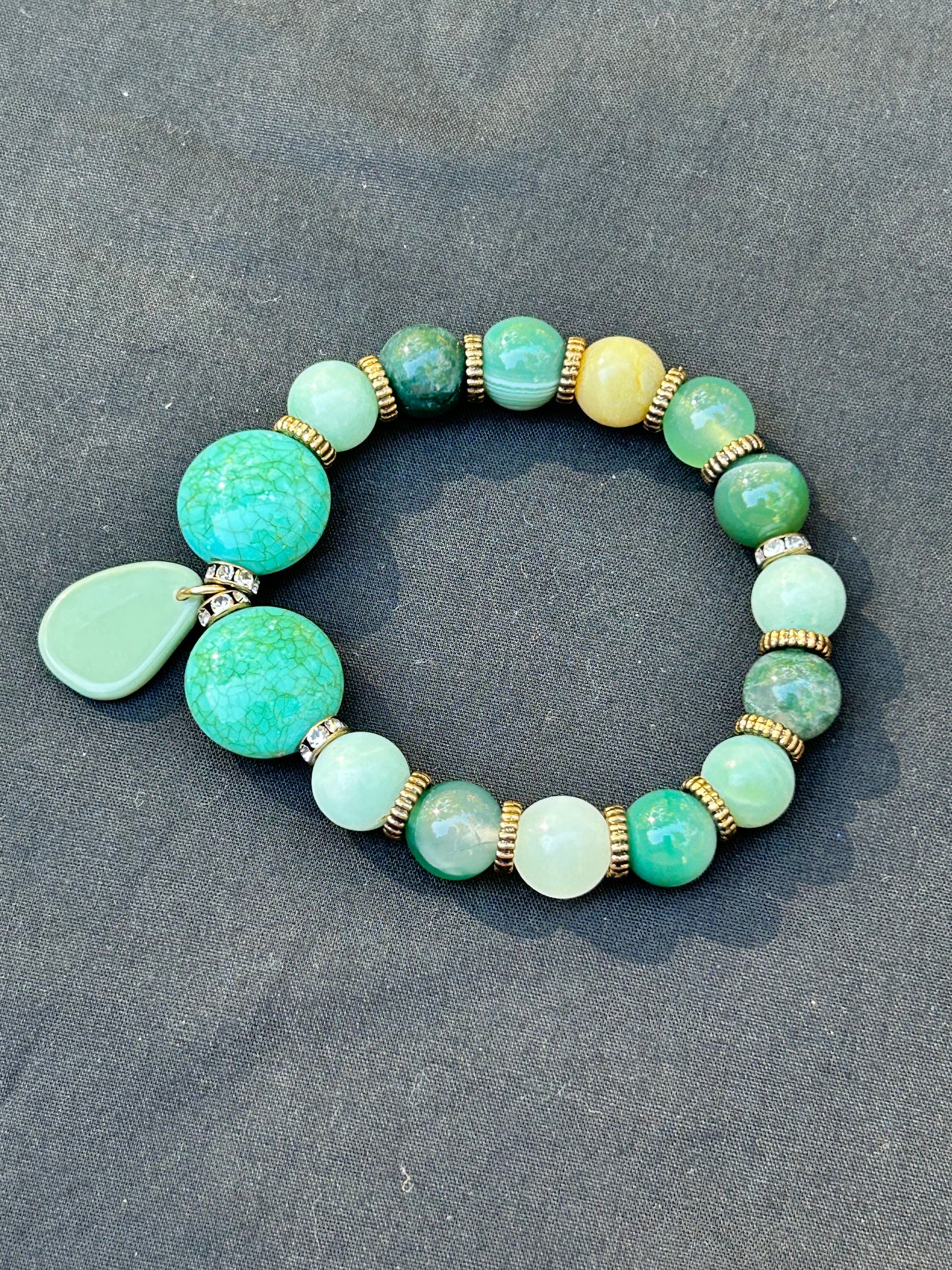 Green Stretch Bracelet with Bronze Accents